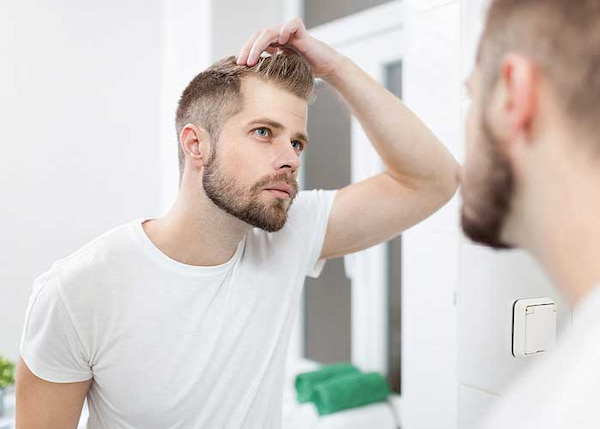 ۱۰ دلیل اصلی توقف رشد موی سر زنان و مردان